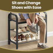 Person sitting on the bench to change shoes above two shelves of footwear
