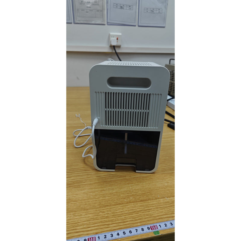 HOMCOM compact dehumidifier rear view showing carry handle and open water tank drawer