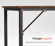 Close-up of the triangular metal strut bracing the desk leg and frame