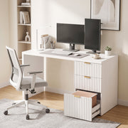 Lifestyle photo of the white computer desk set up with two monitors in a home office