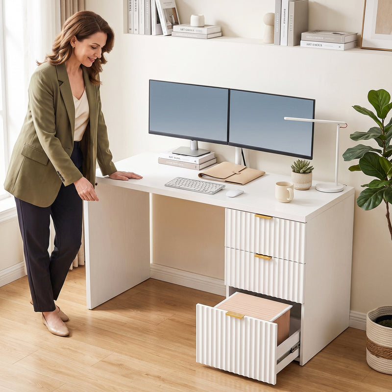Lifestyle photo of a woman beside the white computer desk with the file drawer open
