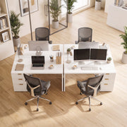 Overhead lifestyle photo of two matching computer desks joined together in a shared office