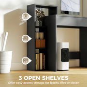 Three open shelves of the black desk holding books and storage boxes