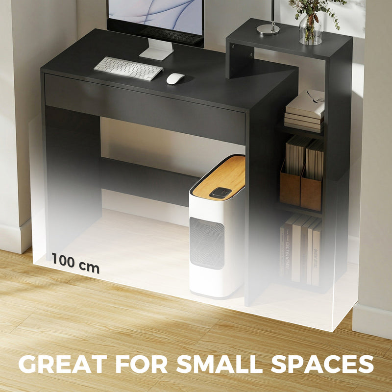 Black 100 cm desk with a monitor and keyboard in a small space