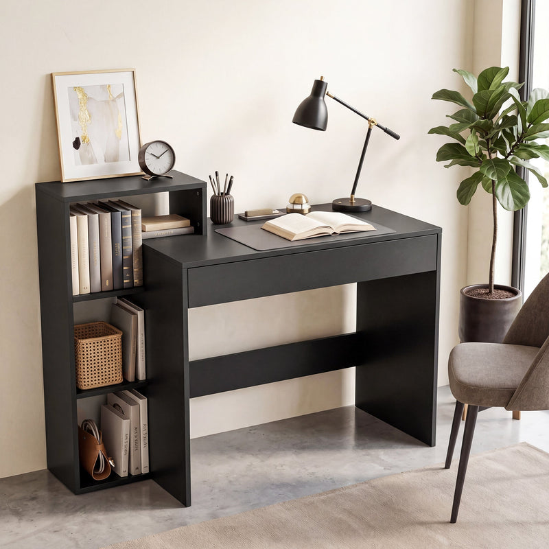 Black desk with a desk lamp, clock and books in a bright room with a plant