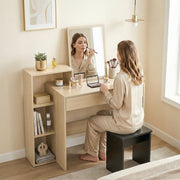 Natural desk used as a dressing table with a mirror and make-up on the desktop