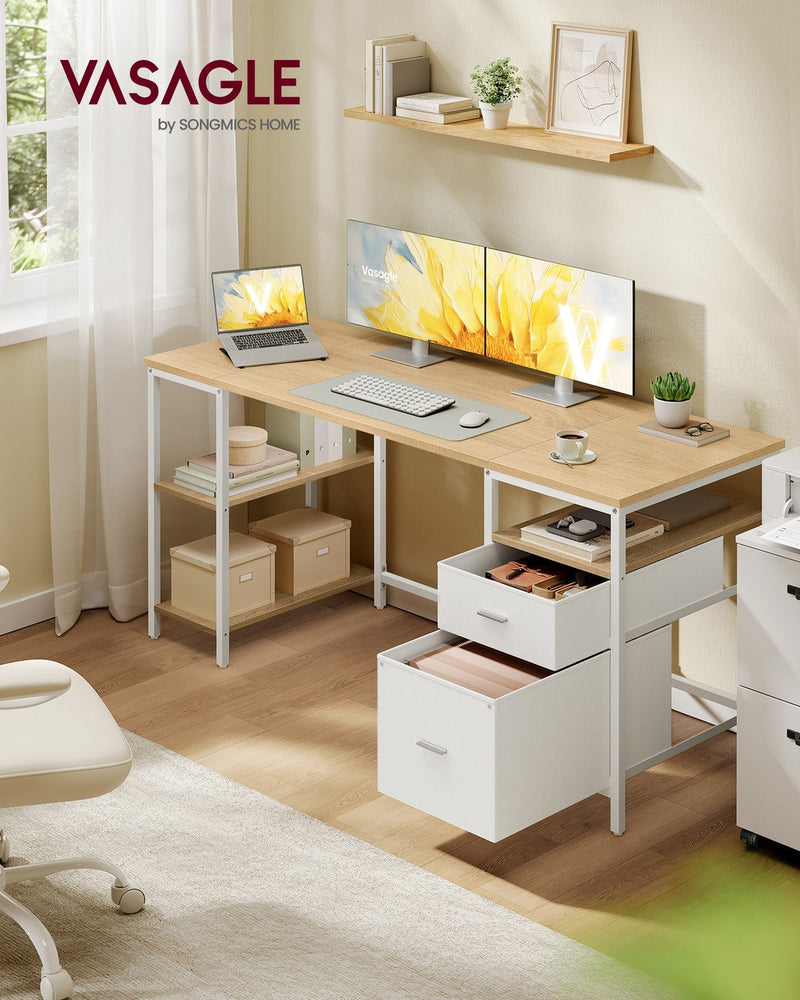 Computer desk styled in a home office with dual monitors, laptop and filing box storage