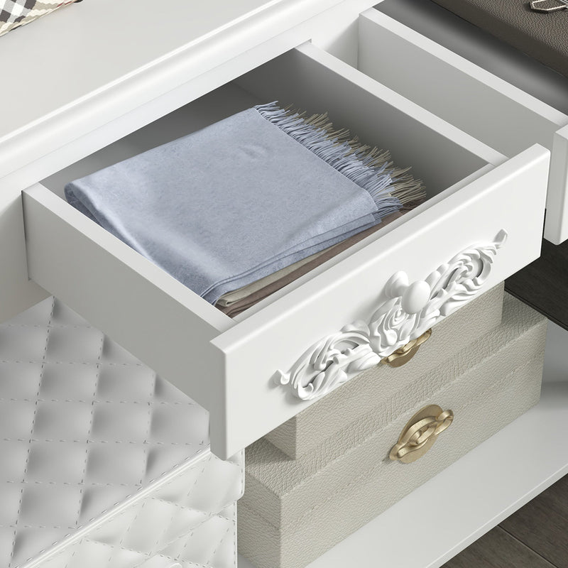 Open drawer with a folded throw blanket, showing the drawer's interior depth