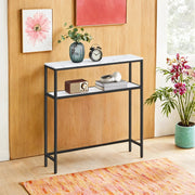 Console table styled in a hallway setting