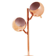 Close-up of copper round shade on twin light table lamp