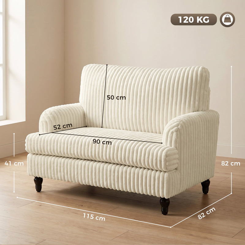 Dimension diagram showing the armchair at 115 cm wide, 82 cm deep and 82 cm tall