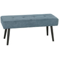 Blue corduroy tufted entryway bench with black powder-coated steel legs, studio shot