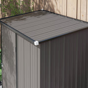 Overhead close-up of the single-slope pent roof panel above the corrugated side wall