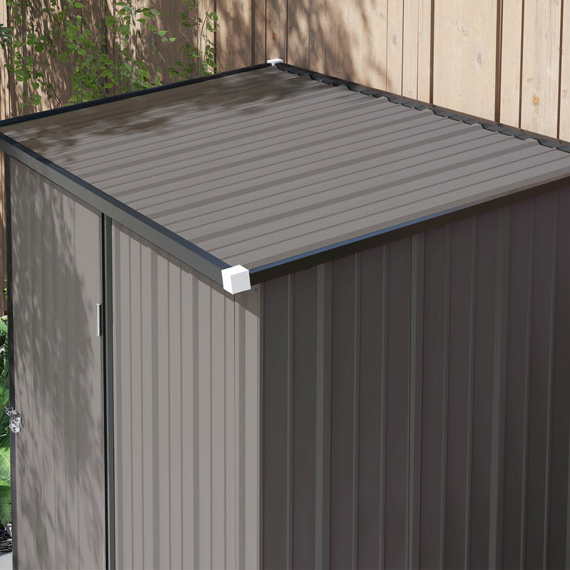 Overhead close-up of the single-slope pent roof panel above the corrugated side wall