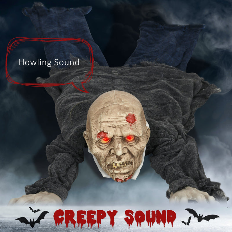 Crawling zombie prop in mist with a howling sound speech bubble