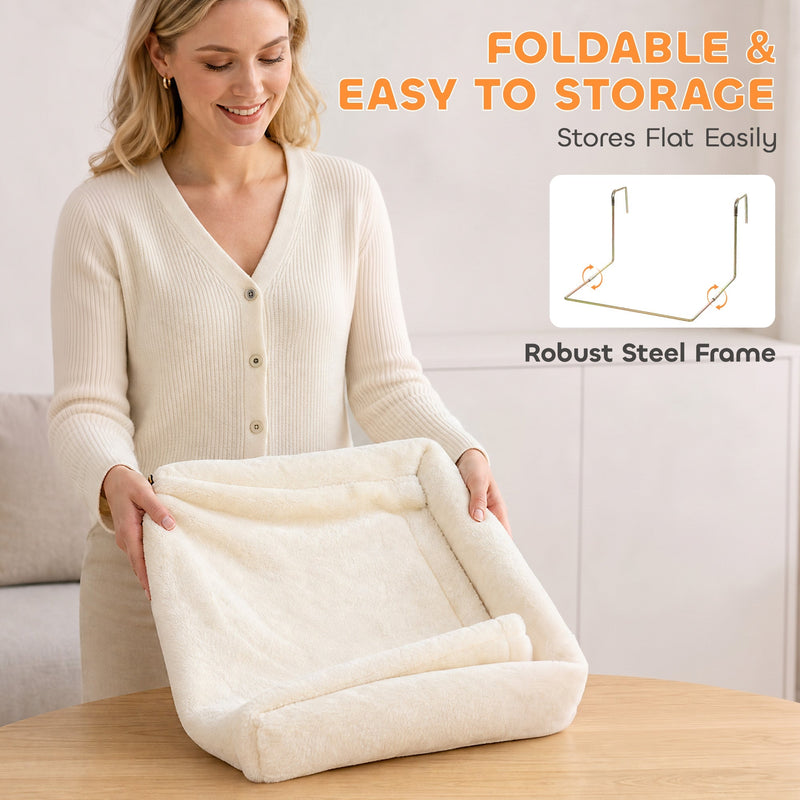 Woman holding the folded cat bed with a steel frame inset