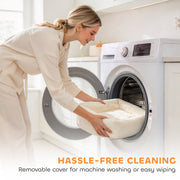 Woman putting the removable cat bed cover into a washing machine