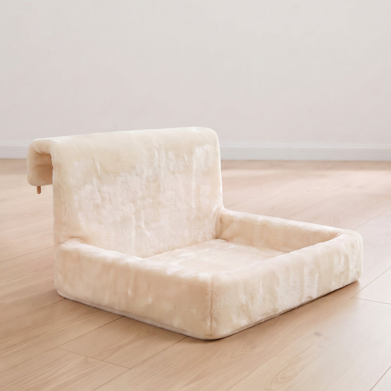 Cream cat bed standing on a wooden floor showing its hanging hooks