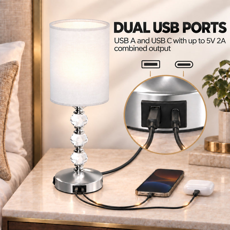USB-A and USB-C charging graphic with a phone and earbuds plugged into the base