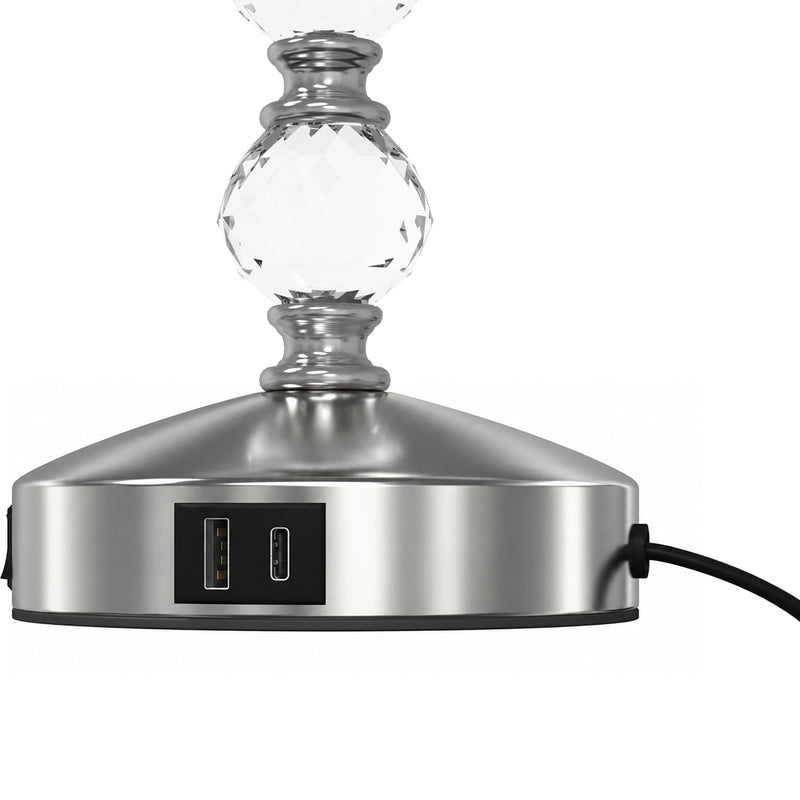 Detail of the round base with the two USB charging ports and cable