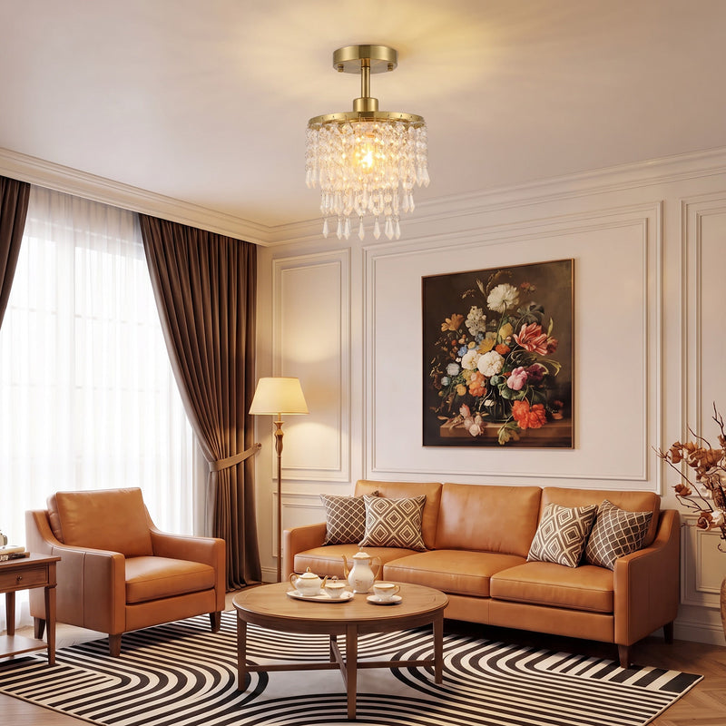 Gold Tone crystal ceiling light hanging above a living room seating area