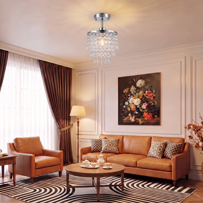 Silver Tone crystal ceiling light hanging above a living room seating area
