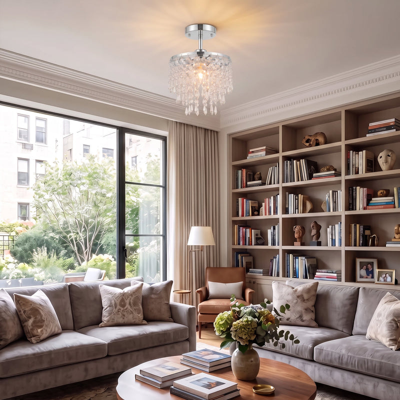 Silver Tone ceiling light above a living room bookshelf and sofa