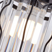 Close-up of the crystal bars with a bulb glowing inside