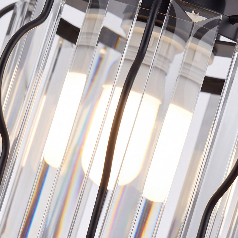 Close-up of the crystal bars with a bulb glowing inside