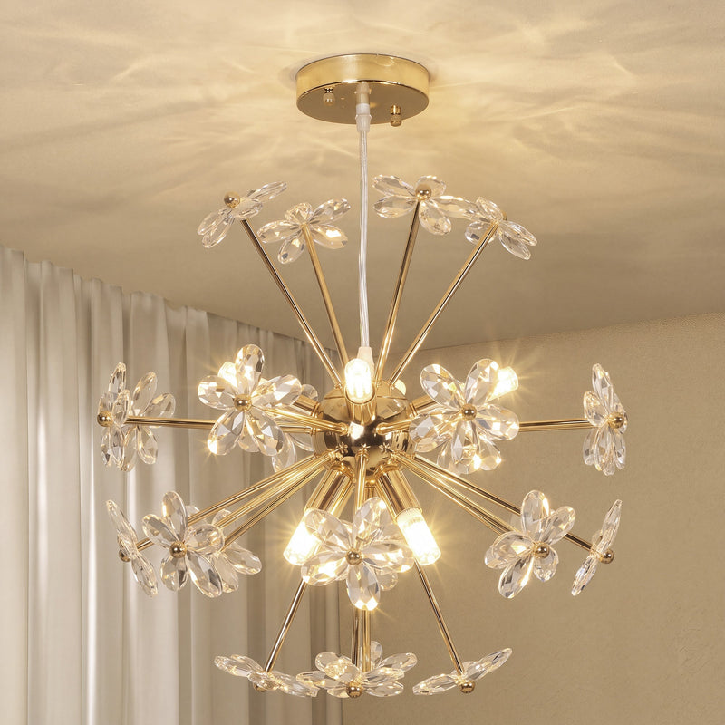 Crystal flower chandelier lit on a ceiling, showing sparkle from the crystal detailing
