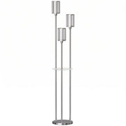 Chrome 3-light crystal glass floor lamp with a round glass shelf on a white background