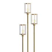 Close-up of the three gold tone poles with crystal glass shades on white