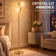 Gold crystal globes casting sparkling light patterns on a bedroom wall