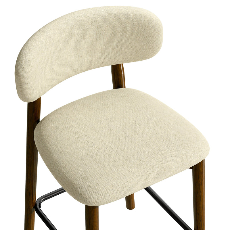 Close-up of a beige padded seat and curved backrest