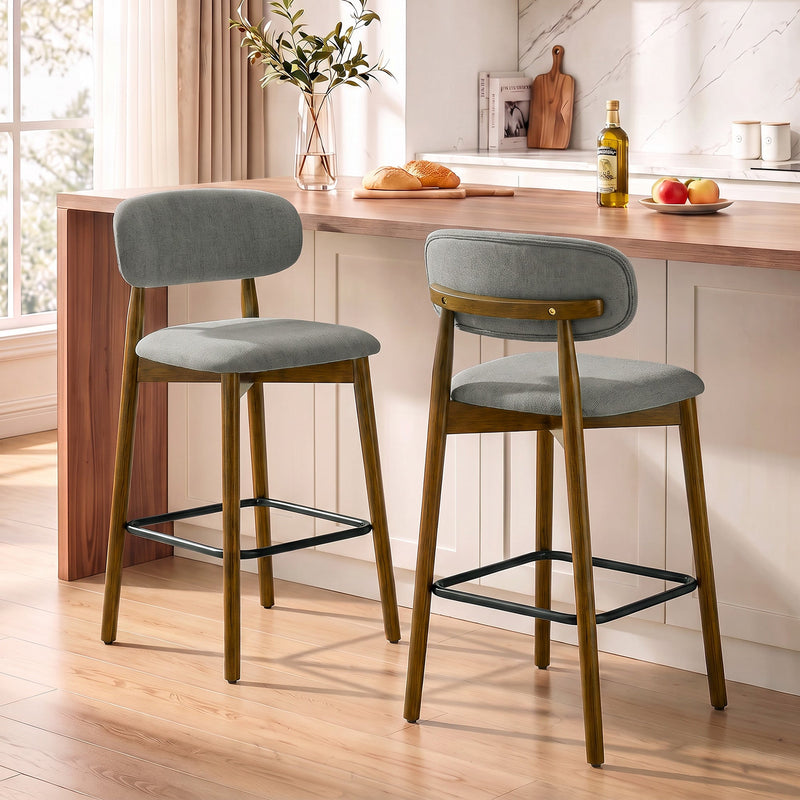 Two grey bar stools at a wooden kitchen counter