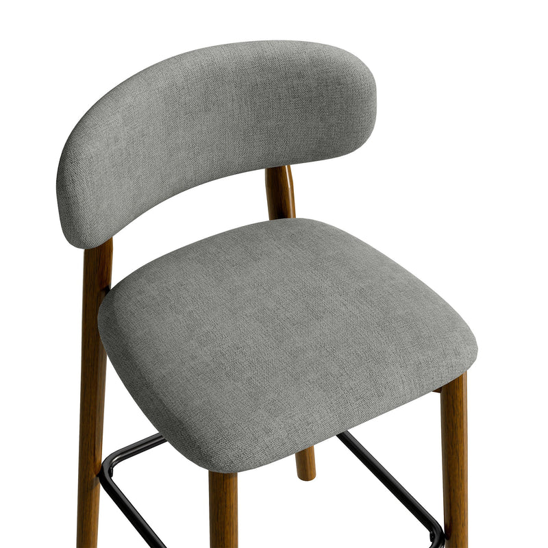 Close-up of a grey padded seat and curved backrest