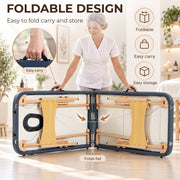 Woman carrying the massage table folded flat by its handle