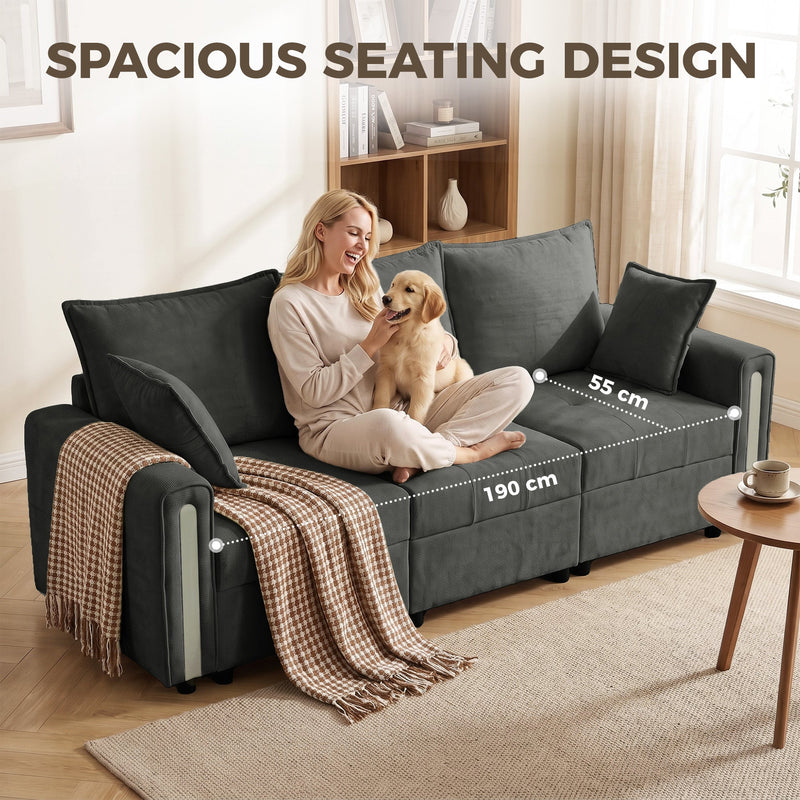 Woman and dog on the dark grey sofa, showing the 190 cm seat width and 55 cm seat depth