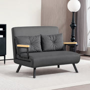 Full dark grey sofa bed shown in loveseat mode in a room setting