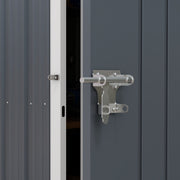 Close-up of the metal slide latch and padlock hasp on the shed door