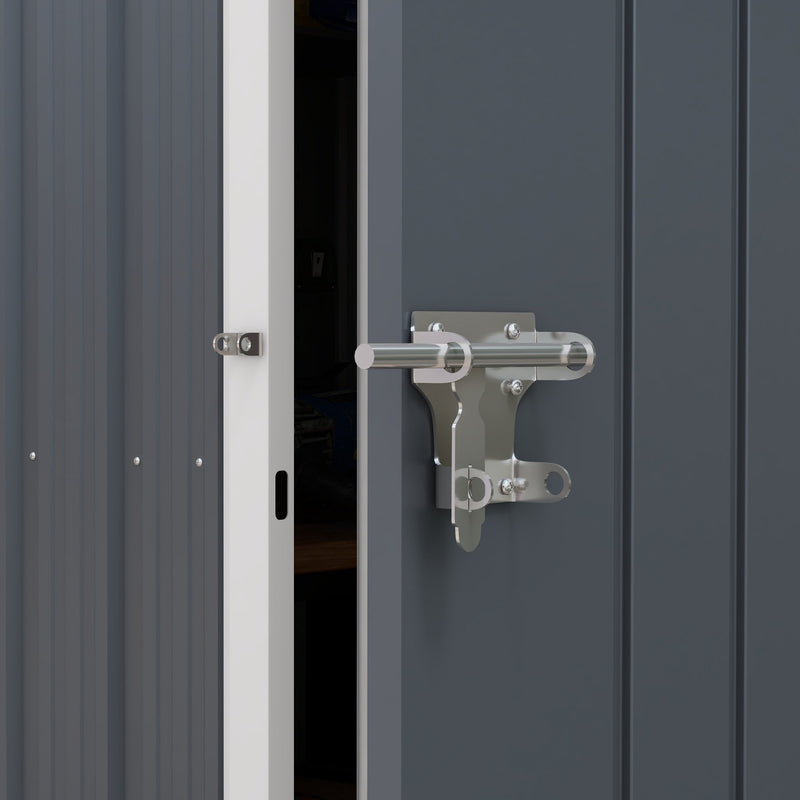 Close-up of the metal slide latch and padlock hasp on the shed door