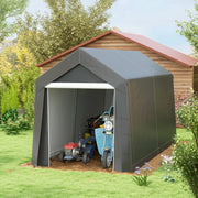 Storage shed tent on a lawn beside a summerhouse with a scooter and mower parked inside
