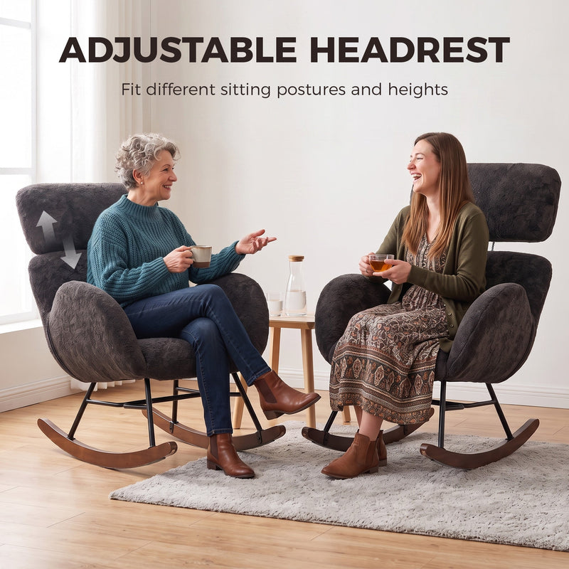Two women chatting while seated in matching dark grey rocking chairs with headrests raised