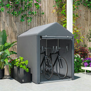 Dark grey shed tent on a patio holding two bicycles in front of a wooden fence