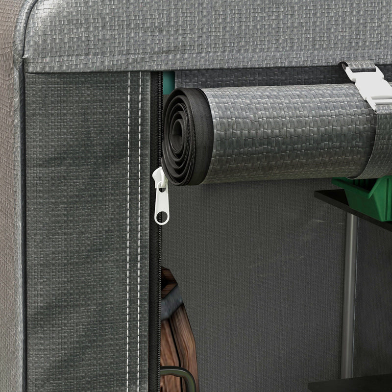 Close-up of the door flap rolled up and clipped above the zipped opening