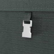 Close-up of a white buckle strap fastened across the dark grey PE cover