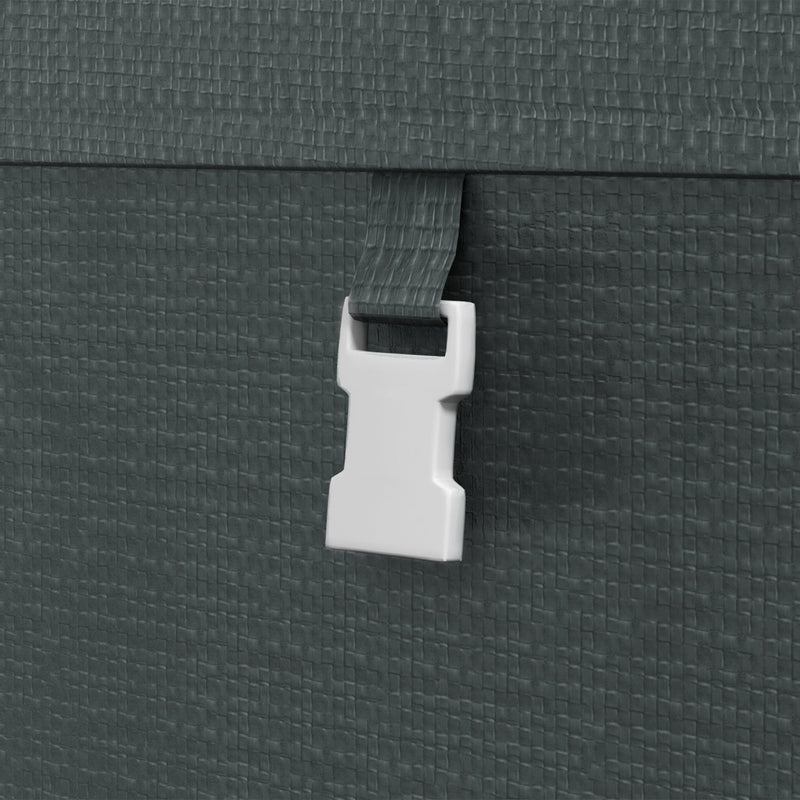 Close-up of a white buckle strap fastened across the dark grey PE cover