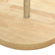 Close-up of the round pine wood base and silver metal pole