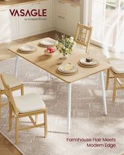 Golden Oak dining table laid for a family meal in a bright farmhouse kitchen