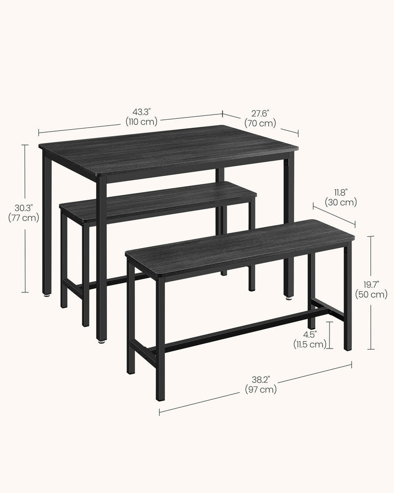 Angled view of the dining table and benches showing the industrial steel legs